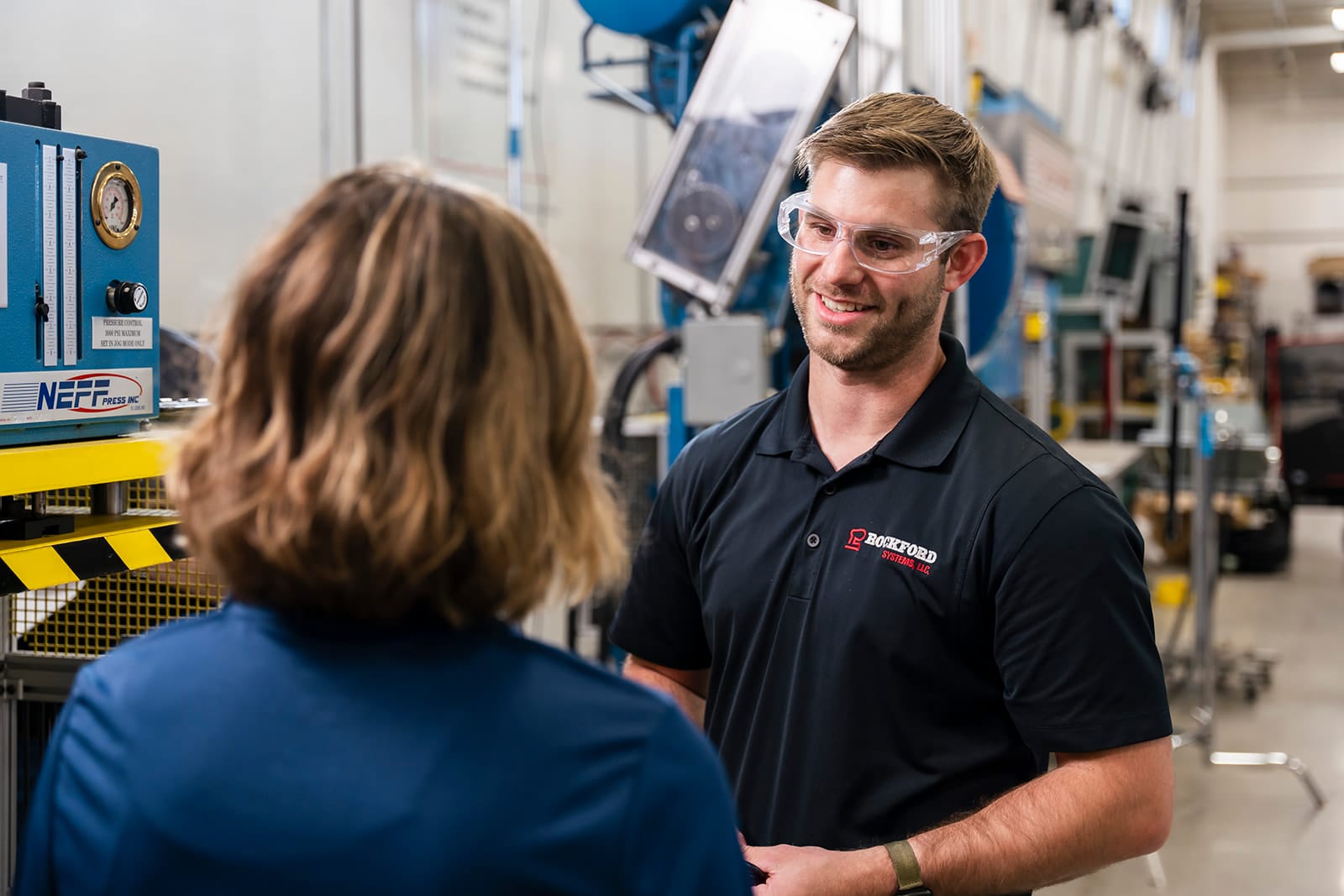workers talking while performing periodic inspections